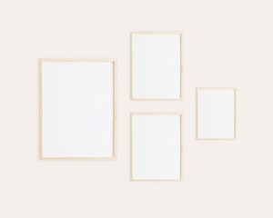 Wall Mural - Gallery frame mockup, 4 vertical wooden frames on wall to showcase wall art.