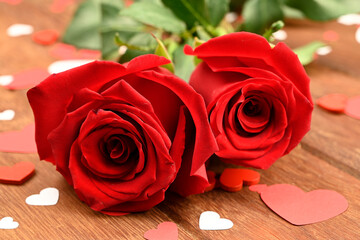 Valentine's Day background. two red roses symbol of love. Valentine's Day concept. Flat view, top view, copy space