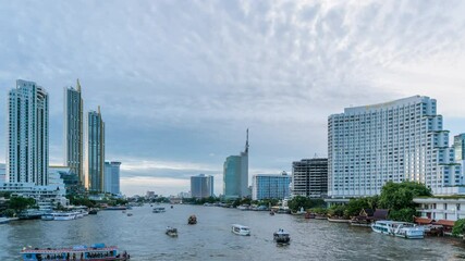 Wall Mural - Bangkok city center financial business district, waterfront cityscape and Chao Phraya River during twilight, day to night; tilt down - Time Lapse