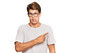 © Krakenimages.com - Handsome caucasian man wearing casual clothes and glasses pointing aside worried and nervous with forefinger, concerned and surprised expression