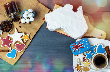 Wall Mural - Happy Australia Day message greeting card - vanilla cream cake and patriotic sweets in a shape of the Australia	
