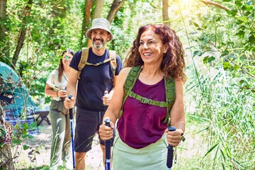 Sticker - Family smiling happy hiking using binoculars at the forest.