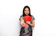 © Sino Images Studio - Asian Woman Dress Traditional Cheongsam, Hold Red Envelope (Angpau) and Give It To You Isolated on White Background