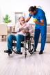 © Elnur - Old man in wheel-chair and young bad caregiver indoors