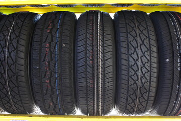 tires of car or vehicle standing in shop