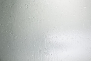 Wall Mural - abstract drops glass background / texture fog rain, seasonal background, clear glass with water