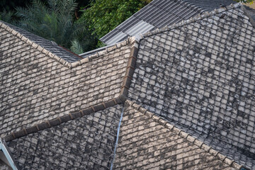 Wall Mural - Antique tile roof exterior architecture building to be conserved an old house in the past 100 years old in South East Asia, Thailand.