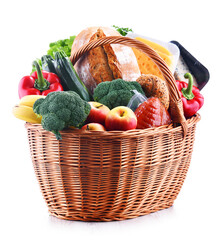 Fototapete - Wicker basket with assorted grocery products isolated on white