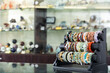 Colorful bracelets made from different precious stones for sale in jewelry store..