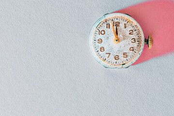 close-up of vintage watches on empty background. the clock shows three minutes to midnight. the new day coming concept. with copyspace for text.
