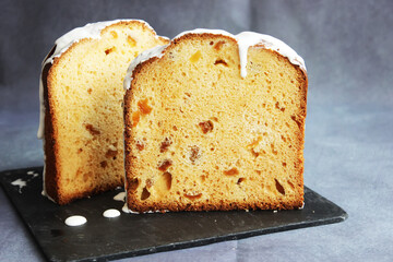 Wall Mural - Half-sliced homemade sweet Easter bread. A piece of Easter Orthodox sweet bread, a cake. Close-up.