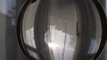 Lens Ball With Sunlight Coming Through Curtains Indoors. Slow Truck Right