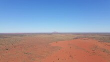 Remote Desert Outback Landscape Near Uluru, Ayers Rock In Northern Territory, Australia. - Wide Shot