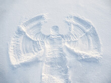 Snow Angel Made In The White Snow. Top Flat Overhead View