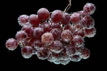 dark grapes in sparkling water