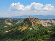Civita di Bagnoregio. Ancient town or hilltop medieval village overlooking to Tiber river valley in province of Viterbo. It is only accessible by walking on long pedestrian bridge from Bagnoregio city