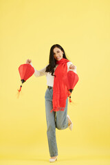 Poster - Beautiful young Asian woman dancing with paper lanterns for Chinese New Year celebration