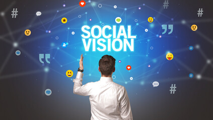rear view of a businessman with social vision inscription, social networking concept
