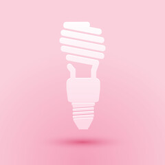 Poster - Paper cut Energy saving light bulb icon isolated on pink background. Paper art style. Vector.