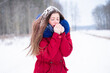 Young woman feeling cold outdoors winter time