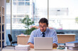 © Elnur - Young male accountant working in the office