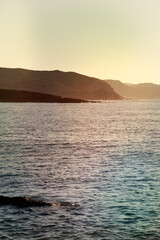 Poster - Vertical shot of a calm sea on the coast of Menorca, Islas Baleares in Spain