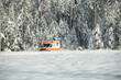 canvas print picture - Krankenwagen im Winter mit Schnee im Einsatz