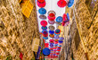 Alley in old Amman decorated with colourful umbrellas, Kingdom of Jordan, Middle East.