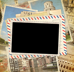 Wall Mural - Vintage travel background with retro post cards and blank photo