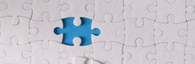White Puzzle Pieces Without One Piece Are On Table Closeup. Business Strategy Solution Concept