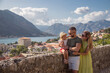 © Julija - happy family travel in Montenegro, looking at Kotor bay and enjoy the view.