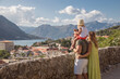 © Julija - happy family travel in Montenegro, looking at Kotor bay and enjoy the view.