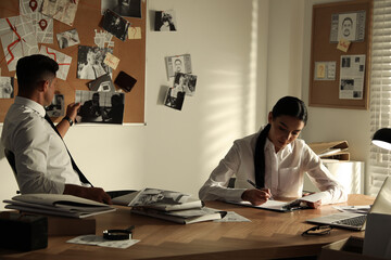 Sticker - Professional detectives working at desk in office