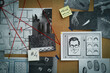 © New Africa - Detective board with fingerprints, crime scene photos and red threads, closeup