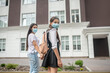 © zinkevych - Mom and daughter in protective masks going to school
