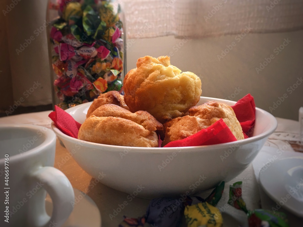 morning breakfast, eclairs homemade cakes on the table, sweet winter morning