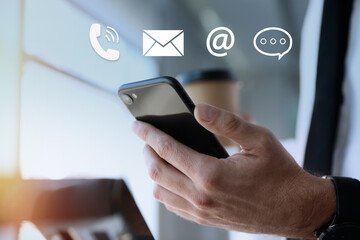 Hotline service. Man with smartphone and different icons, closeup