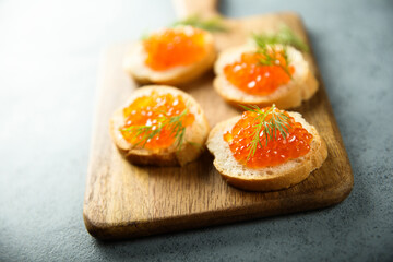 Poster - Red caviar on toast with dill