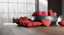 Interior 3D Rending Of Red Fabric Hearts In A Black Bowl. Close Up View With Depth Of Field And View Outside.  