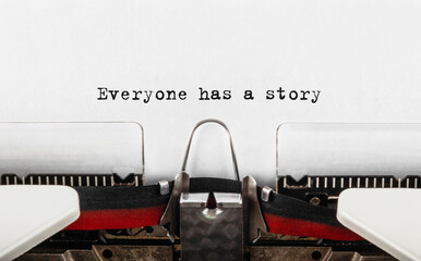 Poster - Text Everyone has a story typed on retro typewriter