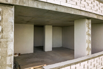 Canvas Print - Rooms interior of new apartment building facade under construction.