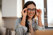 © Drobot Dean - Attractive young smart woman working on laptop