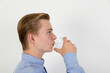 © travelview - teenage boy drinking water out of a glass