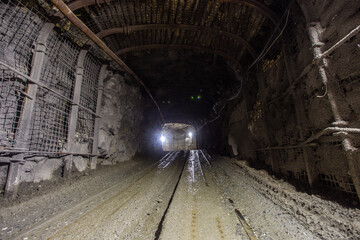 Wall Mural - Underground gold mine shaft tunnel drift with light