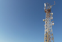 Tower With Mobile Operator Antennas On The Background Sky, 5G, 4G, Mobile Technologies, New Generation Communications