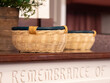 Offering baskets resting on a wooden table in front of the church pulpit