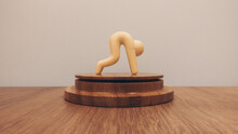 Figure Of A Crawling Man On A Wooden Stand.