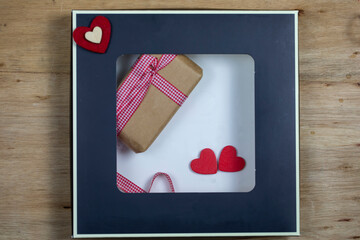 Gift box and hearts, Christmas present, valentine day surprise, birthday concept	
