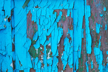 A Fragment Of An Old Door With Peeling Paint