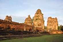 Warm Golden Hour Light On The Temples At Angkor Wat Complex In Cambodia